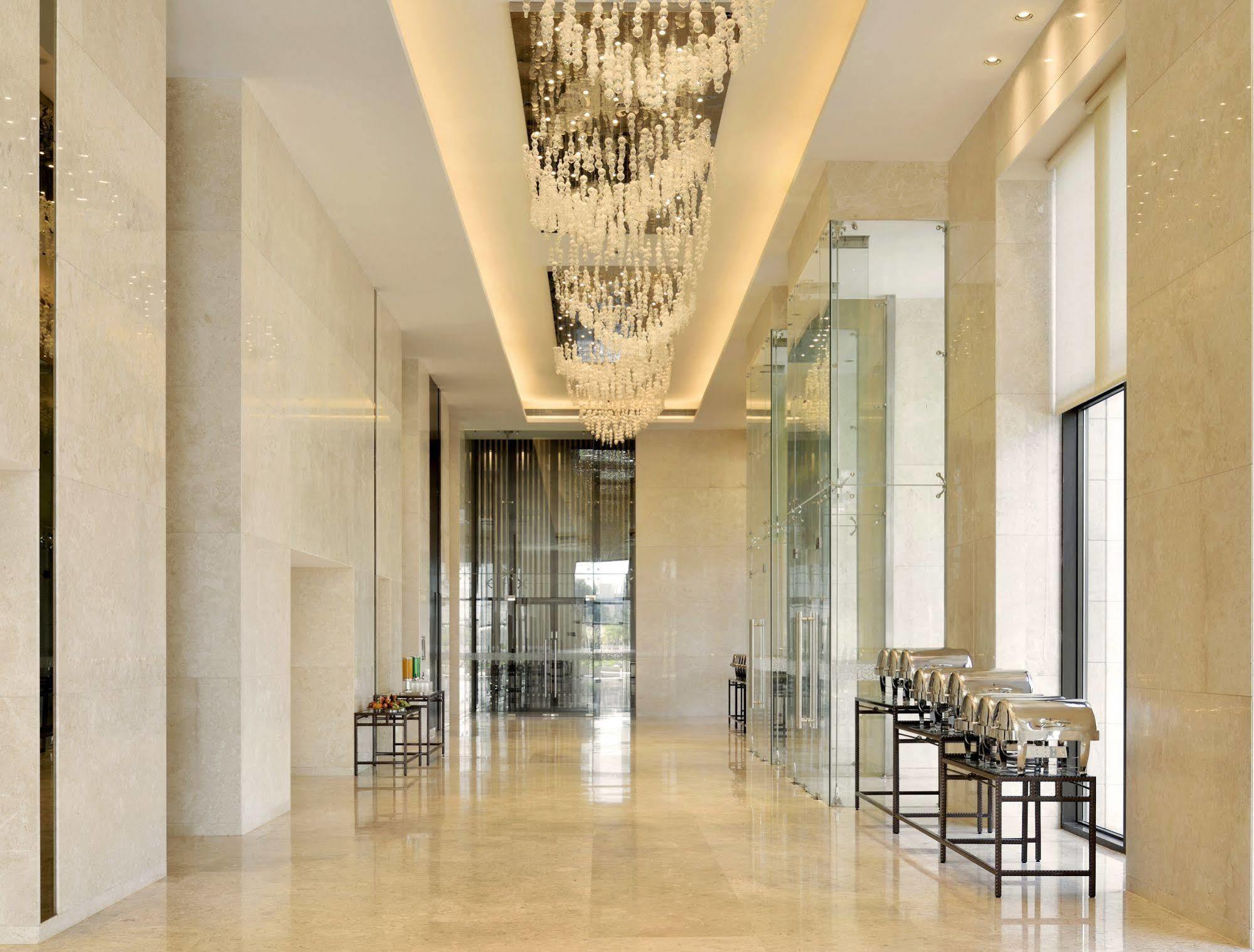 Radisson Blu Coimbatore Exteriör bild The lobby of the hotel